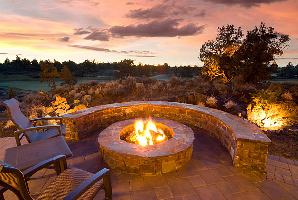Elegant outdoor living space designed in O'Fallon by Precise Outdoors And Design.