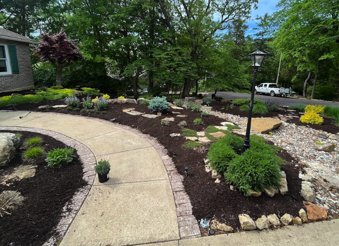 Professional landscaping team working in Foristell, MO